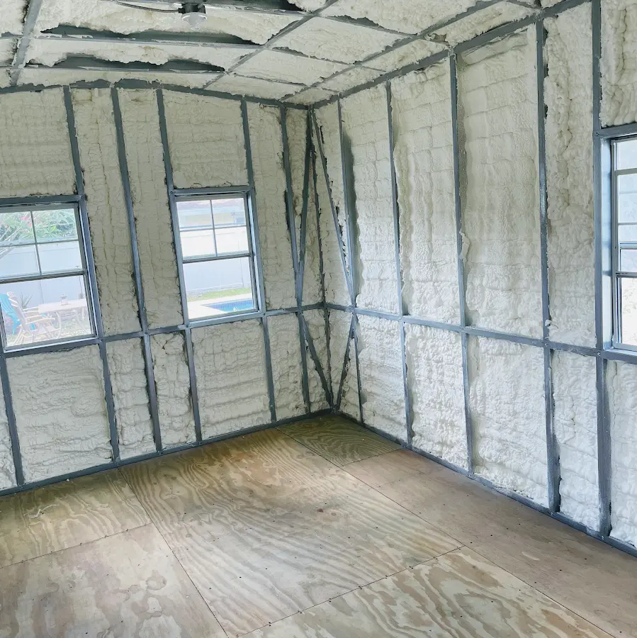 Closed-cell spray foam insulation applied to wall cavities in a residential project in Myrtle Beach